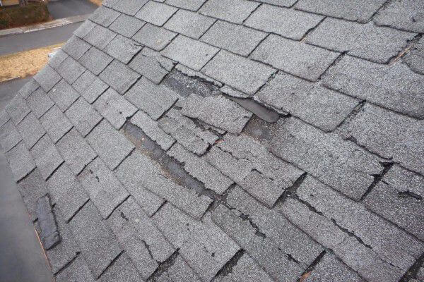 Damaged shingles on small section of roof
