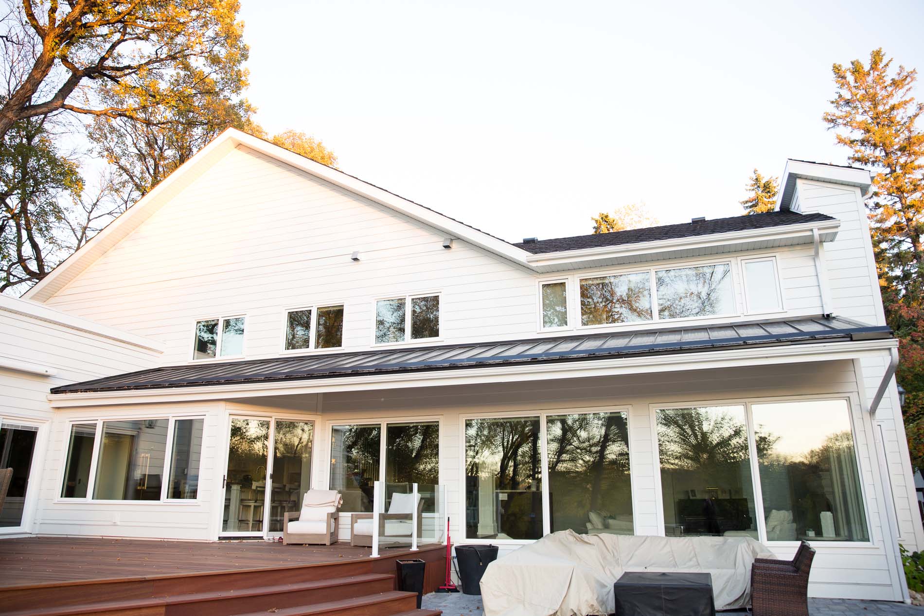 White lap-sided home, rear elevation